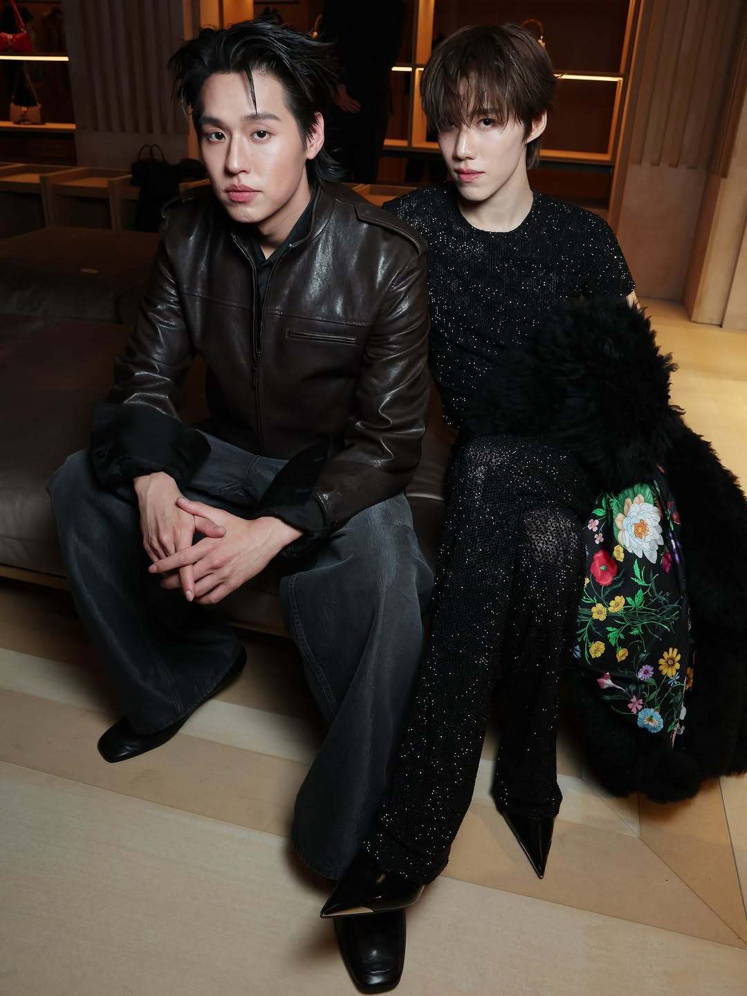 Billkin and PP Krit seated together at the Gucci Spring/Summer 2027 presentation