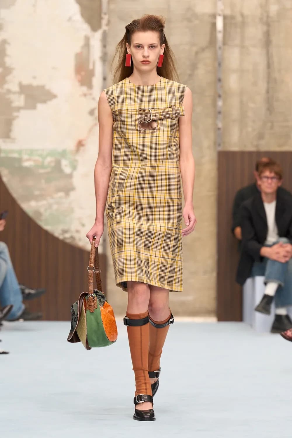 Marni runway look with yellow checks and orange boots