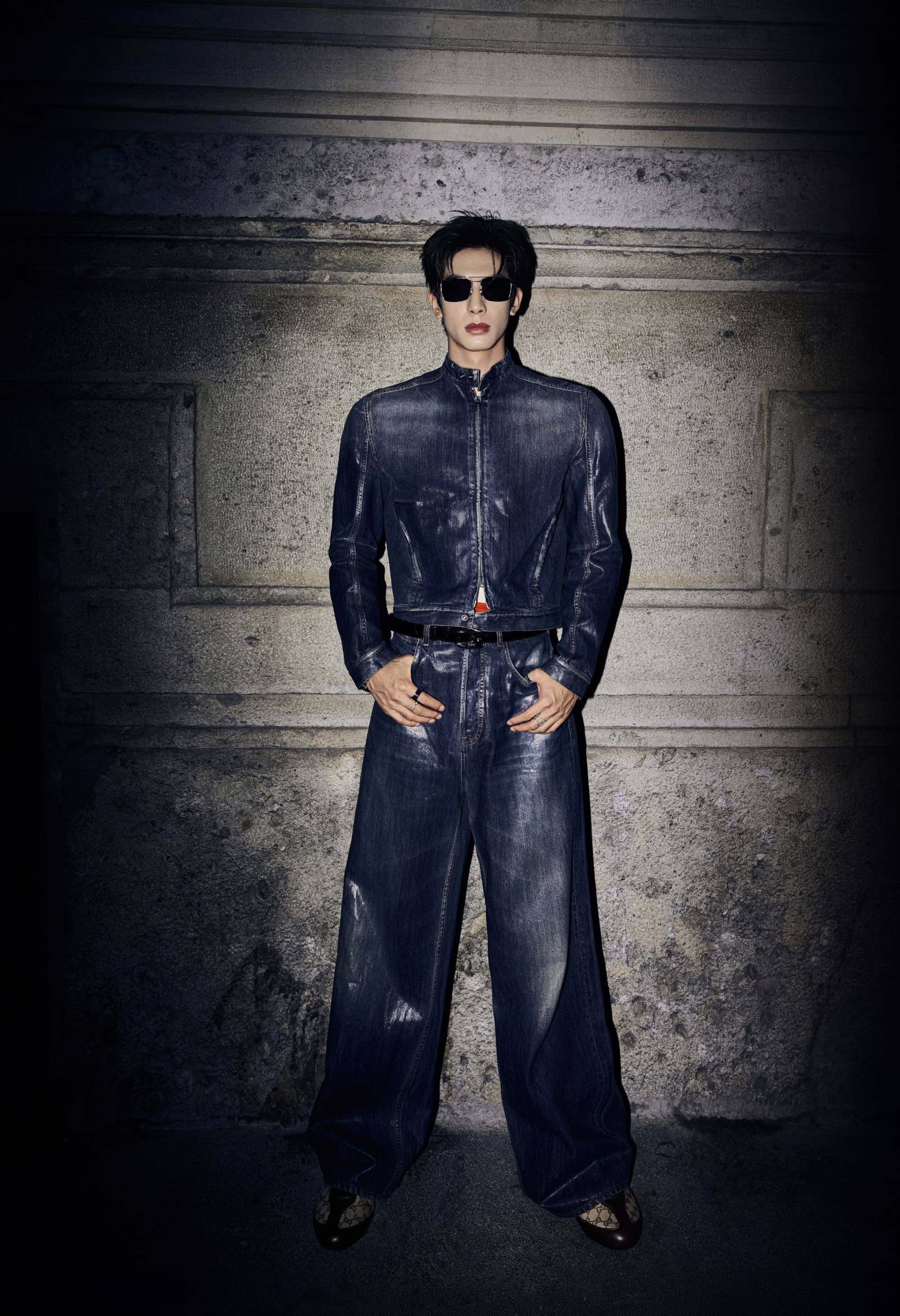 Song Weilong in a dark denim jacket and wide-leg jeans in Milan