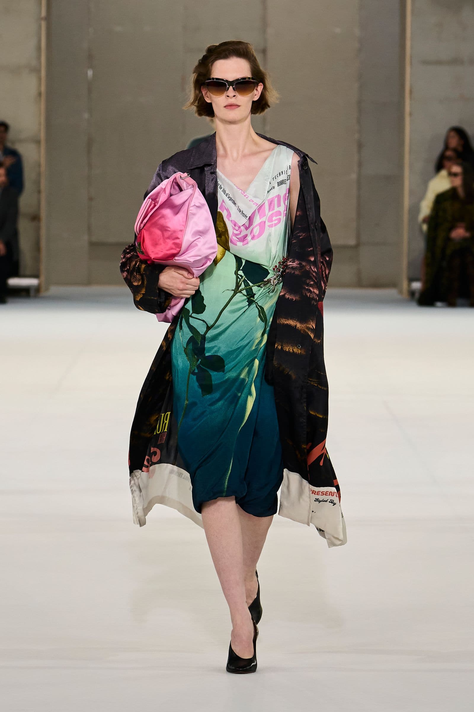 Look 3: dark printed coat over a green floral dress