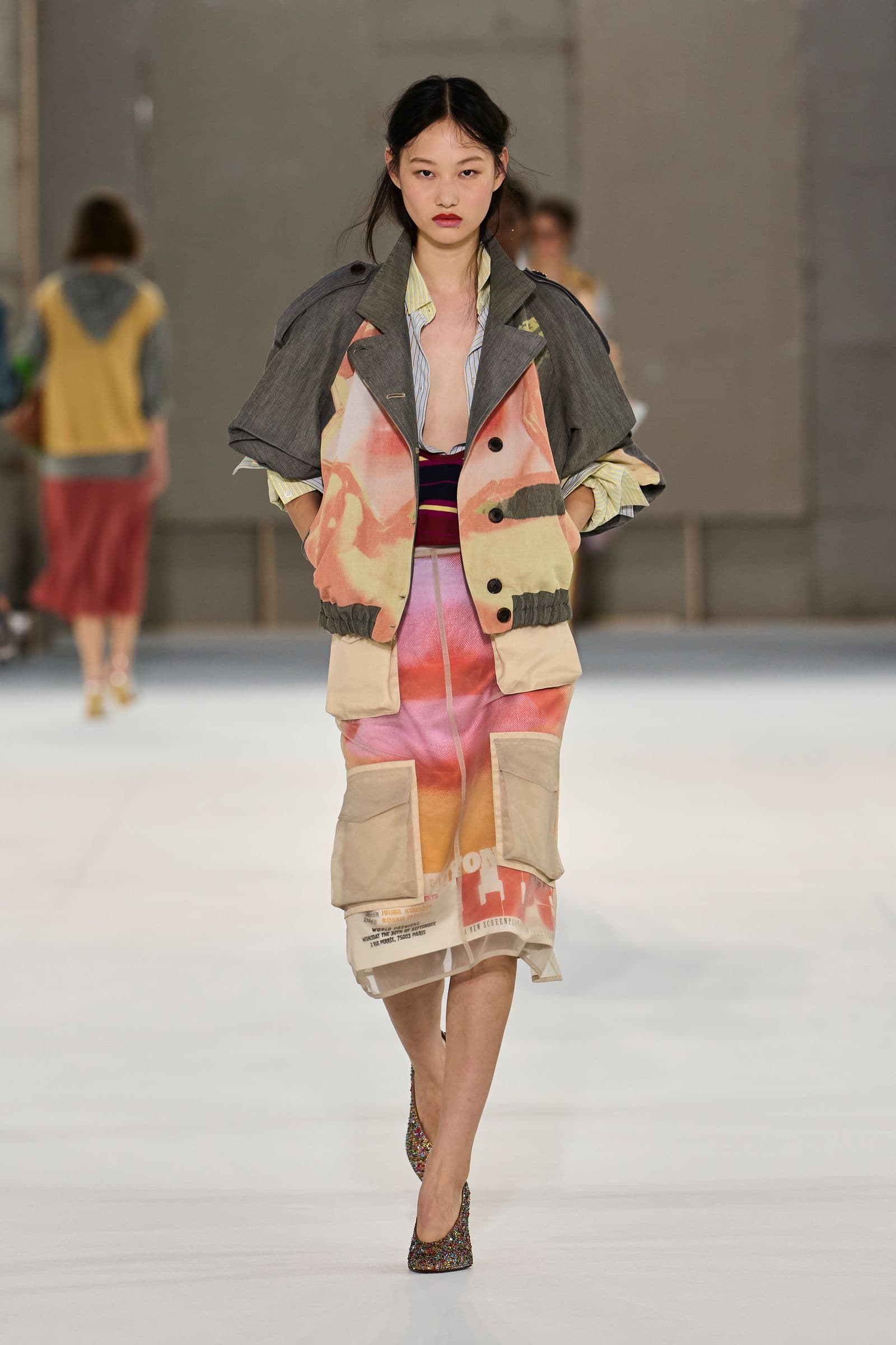 Dries Van Noten Spring 2027 look 29: printed jacket, striped layers and graphic skirt