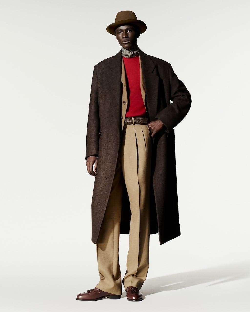 Long brown coat over a red top, Loro Piana Spring 2027